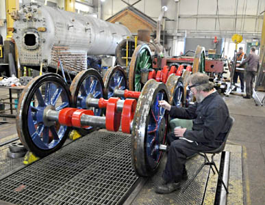 Lewis Nodes applies lining to the wheels of 323 'Bluebell' - Derek Hayward - 8 May 2010